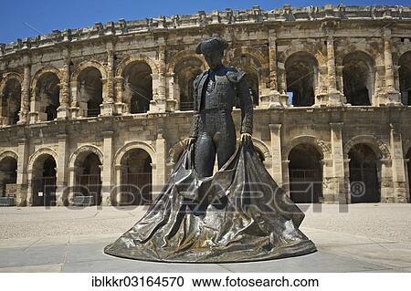 "Statue of a bullfighter in front of the Roman amphitheatre, Nimes, Region Languedoc-Roussillon, France, Europe" View Large Photo Image Stock Image - "Statue of a bullfighter in front of the Roman amphitheatre, Nimes, Region Languedoc-Roussillon, France, Europe". Fotosearch