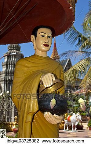 "Statue of a mendicant monk at Wat Preah Prohm Rath temple, Siem Reap, Siem Reap Province, Cambodia, Asia" View Large Photo Image Stock Image - "Statue of a mendicant monk at Wat Preah Prohm Rath temple, Siem Reap, Siem Reap Province, Cambodia, Asia". Fotosearch