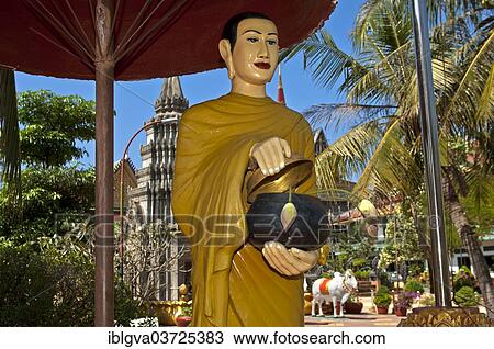 "Statue of a mendicant monk at Wat Preah Prohm Rath temple, Siem Reap, Siem Reap Province, Cambodia, Asia" View Large Photo Image Stock Image - "Statue of a mendicant monk at Wat Preah Prohm Rath temple, Siem Reap, Siem Reap Province, Cambodia, Asia". Fotosearch