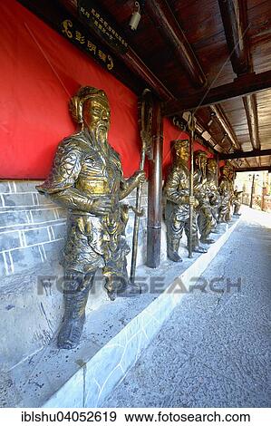 Stock Photo - "Statue of a Tujia Warrior, national minority, Tujia Ethnic Folk Park Garden, Zhangjiajie, Hunan Province, China, Asia". Fotosearch