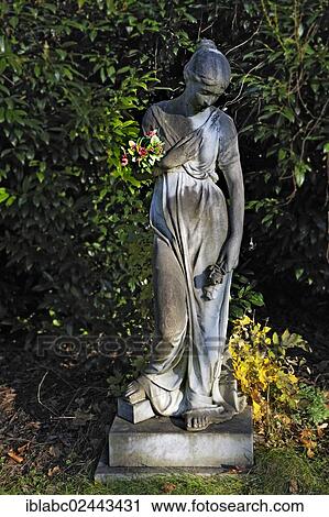 Stock Image - "Statue of a woman, Ostfriedhof cemetery, Munich, Bavaria, Germany, Europe". Fotosearch