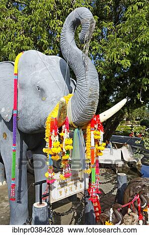 "Statue of an elephant decorated with flowers, Wat Chalong temple, Phuket, Thailand, Asia" View Large Photo Image Stock Photo - "Statue of an elephant decorated with flowers, Wat Chalong temple, Phuket, Thailand, Asia". Fotosearch
