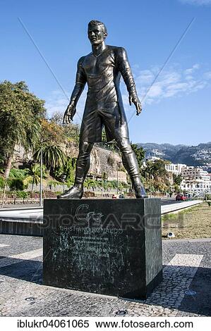 "Statue of footballer Cristiano Ronaldo, CR7, Real Madrid, in the harbour of his native city, Funchal, Madeira, Portugal, Europe" View Large Photo Image Stock Photography - "Statue of footballer Cristiano Ronaldo, CR7, Real Madrid, in the harbour of his native city, Funchal, Madeira, Portugal, Europe". Fotosearch