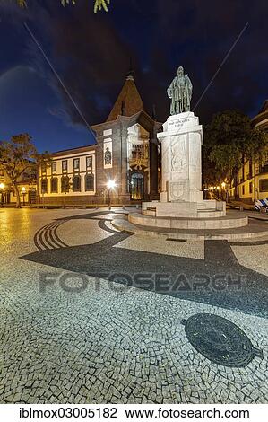 "Statue of Joao Zarco Goncaves in front of the Banco de Portugal, Av Arriaga street in the historic district, Santa Luzia, Funchal, Madeira, Portugal, Europe" View Large Photo Image Stock Image - "Statue of Joao Zarco Goncaves in front of the Banco de Portugal, Av Arriaga street in the historic district, Santa Luzia, Funchal, Madeira, Portugal, Europe". Fotosearch