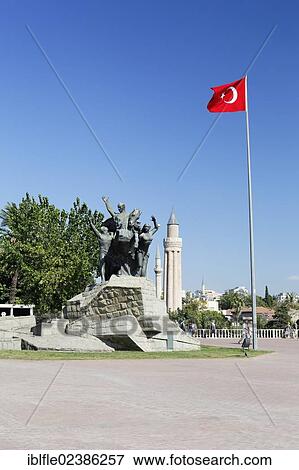 "Statue of Mustafa Kemal Ataturk with the Turkish flag in front of the Yivli Minare Mosque in the historic town centre of Antalya, Kaleici, Turkish Riviera, Turkey, Asia" View Large Photo Image Stock Photo - "Statue of Mustafa Kemal Ataturk with the Turkish flag in front of the Yivli Minare Mosque in the historic town centre of Antalya, Kaleici, Turkish Riviera, Turkey, Asia". Fotosearch