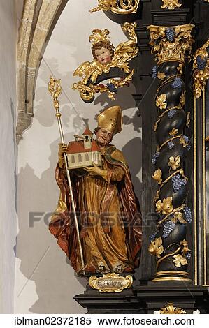 "Statue of St Wolfgang by Meinrad Guggenbichler, Parish Church of St Laurentius in Abtsdorf, town of Attersee, Salzkammergut resort area, Hausruckviertel region, Upper Austria, Austria, Europe" View Large Photo Image Stock Photography - "Statue of St Wolfgang by Meinrad Guggenbichler, Parish Church of St Laurentius in Abtsdorf, town of Attersee, Salzkammergut resort area, Hausruckviertel region, Upper Austria, Austria, Europe". Fotosearch