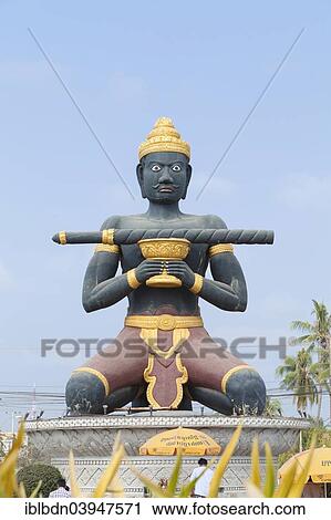 Stock Image - "Statue of Ta Dambong with his magic stick, symbol of the city of Battambang, Cambodia, Asia". Fotosearch