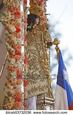 "Statue of the Virgen del Rosario, or Virgin of the Rosary, patron saint of the mine workers, Fiesta Grande, Andacollo, Coquimbo Region, Chile, South America" View Large Photo Image Stock Photograph - "Statue of the Virgen del Rosario, or Virgin of the Rosary, patron saint of the mine workers, Fiesta Grande, Andacollo, Coquimbo Region, Chile, South America". Fotosearch