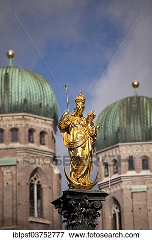 "Statue of the Virgin Mary, Mariensaeule, Marian column, with the towers of the Munich Frauenkirche church at back, Munich, Upper Bavaria, Bavaria, Germany, Europe" View Large Photo Image Stock Photo - "Statue of the Virgin Mary, Mariensaeule, Marian column, with the towers of the Munich Frauenkirche church at back, Munich, Upper Bavaria, Bavaria, Germany, Europe". Fotosearch