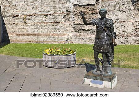 "Statue of Trajan in front of a section of the Roman wall, Tower Hill, City of London, London, England, United Kingdom, Europe" View Large Photo Image Stock Image - "Statue of Trajan in front of a section of the Roman wall, Tower Hill, City of London, London, England, United Kingdom, Europe". Fotosearch