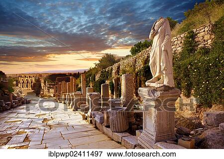 "Statue on Curetes Street looking towards the Library of Celsus, Ephesus Archaeological Site, Anatolia, Turkey, Asia" View Large Photo Image Stock Photo - "Statue on Curetes Street looking towards the Library of Celsus, Ephesus Archaeological Site, Anatolia, Turkey, Asia". Fotosearch