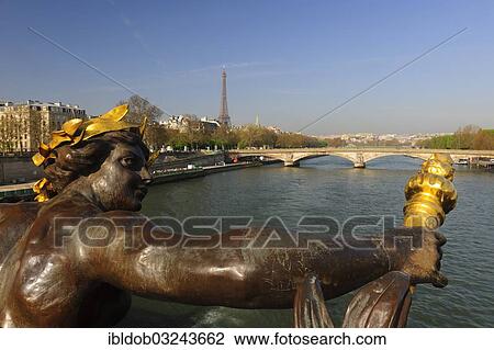"Statue on the Pont Alexandre III., Seine River, Tour Eiffel, Eiffel Tower at back, Paris, Ile-de-France, France, Europe" View Large Photo Image Stock Image - "Statue on the Pont Alexandre III., Seine River, Tour Eiffel, Eiffel Tower at back, Paris, Ile-de-France, France, Europe". Fotosearch