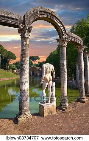 Stock Photo - "Statues and columns that surround a rectangular basin, Canopus, that ends at The Serapaeum, Hadrian's Villa, Villa Adriana, UNESCO World Heritage Site, Tivoli, Lazio, Italy, Europe". Fotosearch