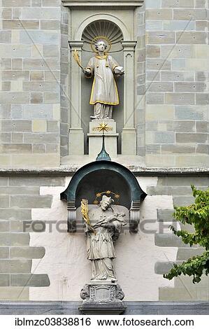 Stock Photograph - "Statues of Johannes Nepomuk and St. Stephen, 1710, on the outer wall at the choir end of St. Stephen's Church, Konstanz, Baden-Wurttemberg, Germany, Europe". Fotosearch