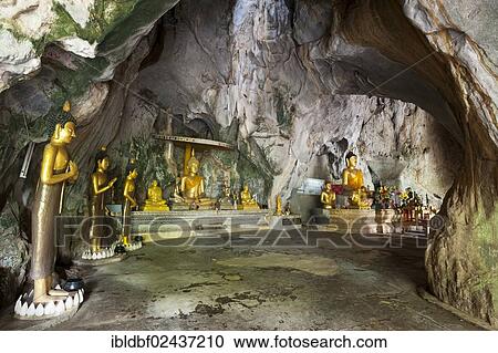 Stock Image - "Statues or sculptures in the Buddha Cave, Mae Cham, Chiang Rai Province, Northern Thailand, Thailand, Asia". Fotosearch