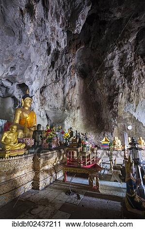 Stock Image - "Statues or sculptures in the Buddha Cave, Mae Cham, Chiang Rai Province, Northern Thailand, Thailand, Asia". Fotosearch