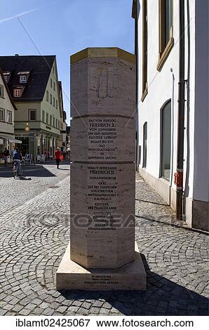 Stock Photo - Staufer stele, on Johannisplatz square, referring to the Hohenstaufen influences, Emperors Frederick I and Frederick II and the Lorch Monastery, Kloster Lorch, Schwaebisch Gmuend, Baden-Wuerttemberg, Germany, Europe. Fotosearch