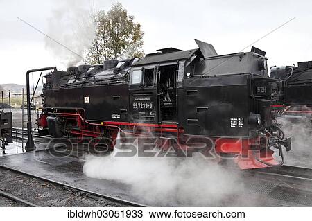 Stock Image - "Steam locomotive of the Harz Narrow Gauge Railways, Brocken Railway in the station, Harz, Wernigerode, Saxony-Anhalt, Germany, Europe". Fotosearch
