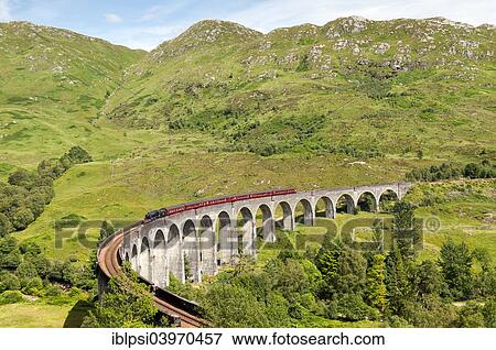 "Steam train on Glenfinnan Viaduct, arched railway bridge on West Highland Line, Lochaber, Scotland, United Kingdom, Europe" View Large Photo Image Stock Photo - "Steam train on Glenfinnan Viaduct, arched railway bridge on West Highland Line, Lochaber, Scotland, United Kingdom, Europe". Fotosearch