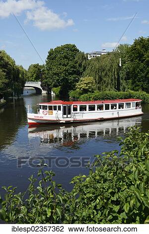 Stock Image - "Steamer on the course of the Alster river at the towpath, Hamburg, Hamburg, Germany, Europe". Fotosearch