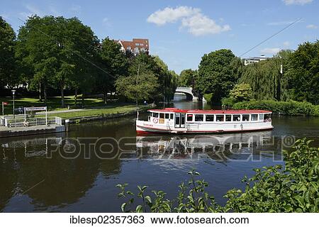 "Steamer on the course of the Alster river at the towpath, pier, Streekbruecke bridge, Hamburg, Hamburg, Germany, Europe" View Large Photo Image Stock Image - "Steamer on the course of the Alster river at the towpath, pier, Streekbruecke bridge, Hamburg, Hamburg, Germany, Europe". Fotosearch