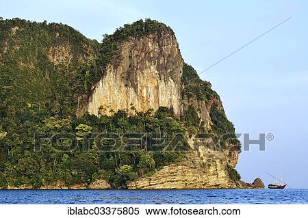 "Steep rocks, cliffs, Raja Ampat, West Papua, Indonesia, Asia" View Large Photo Image Stock Photography - "Steep rocks, cliffs, Raja Ampat, West Papua, Indonesia, Asia". Fotosearch