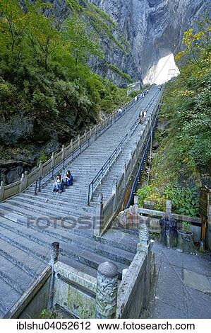 "Steep staircase with 900 steps to Heaven's Gate, Tianmen Cave, the world's largest natural water eroded cave, Tianmen National Park, Hunan Province, China, Asia" View Large Photo Image Stock Image - "Steep staircase with 900 steps to Heaven's Gate, Tianmen Cave, the world's largest natural water eroded cave, Tianmen National Park, Hunan Province, China, Asia". Fotosearch