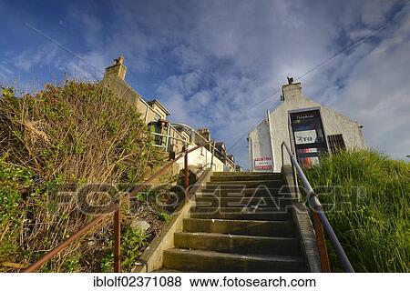 "Steep stairs leading from the harbour up the cliffs to the houses of Gardenstown, Banffshire, Scotland, United Kingdom, Europe" View Large Photo Image Stock Photo - "Steep stairs leading from the harbour up the cliffs to the houses of Gardenstown, Banffshire, Scotland, United Kingdom, Europe". Fotosearch