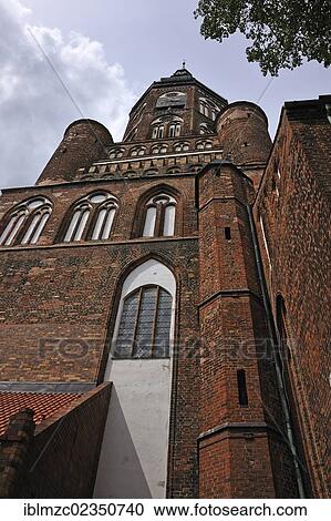 "Steeple of Greifswald Cathedral, around 1300, was rebuilt after it collapsed in 1653, Domstrasse street, Greifswald, Mecklenburg-Western Pomerania, Germany, Europe" View Large Photo Image Stock Image - "Steeple of Greifswald Cathedral, around 1300, was rebuilt after it collapsed in 1653, Domstrasse street, Greifswald, Mecklenburg-Western Pomerania, Germany, Europe". Fotosearch