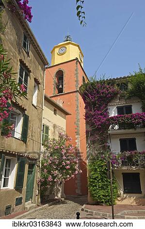 Stock Image - "Steeple of the church of Saint Tropez in the old town, Cote d? ÇÖAzur, Saint-Tropez, Departement Var, Region Provence-Alpes-Cote d? ÇÖAzur, France, Europe". Fotosearch