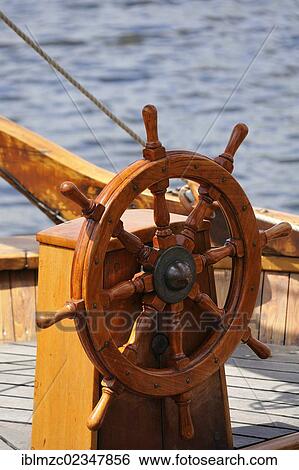"Steering wheel on an old sailing boat, Museumshafen museum harbor, Greifswald, Mecklenburg-Western Pomerania, Germany, Europe" View Large Photo Image Stock Photograph - "Steering wheel on an old sailing boat, Museumshafen museum harbor, Greifswald, Mecklenburg-Western Pomerania, Germany, Europe". Fotosearch