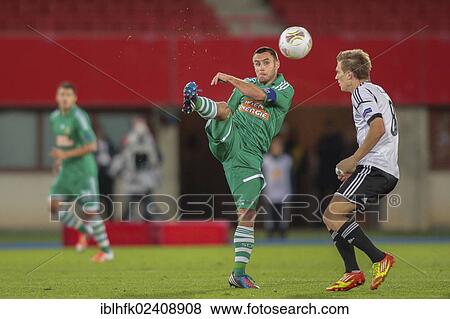 "Steffen Hoffmann, #11 Rapid, and Borek Dockal, #8 Trondheim, fight for the ball during the Europa League soccer game on September 20, 2012 in Vienna, Austria, Europe" View Large Photo Image Stock Photo - "Steffen Hoffmann, #11 Rapid, and Borek Dockal, #8 Trondheim, fight for the ball during the Europa League soccer game on September 20, 2012 in Vienna, Austria, Europe". Fotosearch