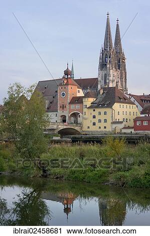 Stock Image - "Steinerne Bruecke stone bridge, Danube, Cathedral St. Peter's Cathedral, salt storage, or Brueckentor Brueckturm, Regensburg, Upper Palatinate, Bavaria, Germany, Europe". Fotosearch