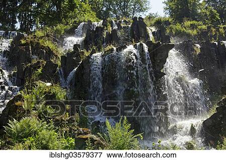 Stock Photo - "Steinhoefer Waterfall, trick fountains, Bergpark Wilhelmshohe, Kassel, Hesse, Germany, Europe". Fotosearch