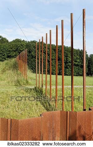Stock Image - "Stelae with rampart markings, ancient battlefield, Varus Battle or Battle of the Teutoburg Forest, Kalkriese Museum and Park, Osnabruecker Land region, Lower Saxony, Germany, Europe". Fotosearch