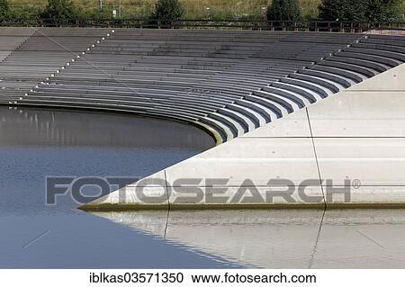 "Steps for the proposed construction project """"Eurogate"""" by Sir Norman Foster, Innenhafen, Duisburg, Ruhr district, North Rhine-Westphalia, Germany, Europe" View Large Photo Image Stock Image - "Steps for the proposed construction project """"Eurogate"""" by Sir Norman Foster, Innenhafen, Duisburg, Ruhr district, North Rhine-Westphalia, Germany, Europe". Fotosearch