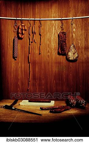 "Still life in a butcher's store with a wooden ambience with cutting tools, sausages and meat products" View Large Photo Image Stock Image - "Still life in a butcher's store with a wooden ambience with cutting tools, sausages and meat products". Fotosearch