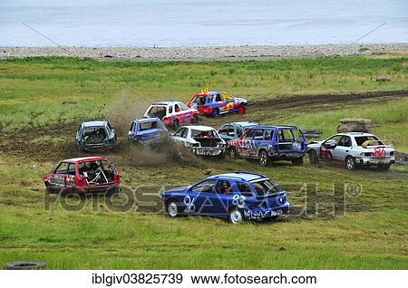 Stock Photo - "Stock car race on a meadow at the beach near Golspie, Caithness Sutherland and Easter Ross, Highland, Scotland, United Kingdom, Europe". Fotosearch
