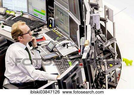 "Stockbroker on the trading floor of the Frankfurt Stock Exchange, Deutsche Borse AG, Frankfurt am Main, Hesse, Germany, Europe" View Large Photo Image Stock Photograph - "Stockbroker on the trading floor of the Frankfurt Stock Exchange, Deutsche Borse AG, Frankfurt am Main, Hesse, Germany, Europe". Fotosearch