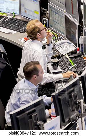 Stock Photography - "Stockbrokers on the trading floor of the Frankfurt Stock Exchange, Deutsche Borse AG, Frankfurt am Main, Hesse, Germany, Europe". Fotosearch