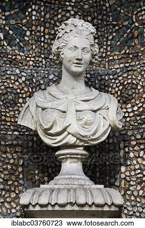 Stock Image - "Stone bust on a wall of the Bavarian National Museum, Munich, Upper Bavaria, Bavaria, Germany, Europe". Fotosearch