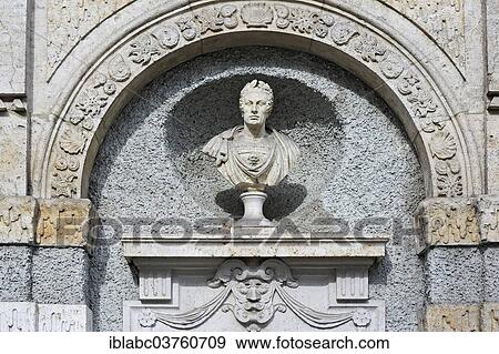 Stock Photo - "Stone bust on a wall of the Bavarian National Museum, Munich, Upper Bavaria, Bavaria, Germany, Europe". Fotosearch