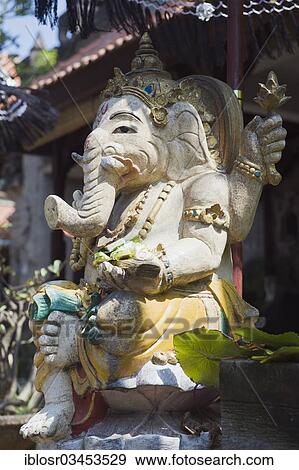 "Stone figure of Ganesha with an umbrella, Padang Bai, Bali, Indonesia, Asia" View Large Photo Image Stock Photo - "Stone figure of Ganesha with an umbrella, Padang Bai, Bali, Indonesia, Asia". Fotosearch