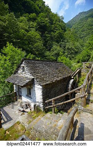"Stone house, mill, in rustic mountain peasant village of Corippo, Val Verzasca, Ticino, Alps, Switzerland, Europe" View Large Photo Image Stock Photo - "Stone house, mill, in rustic mountain peasant village of Corippo, Val Verzasca, Ticino, Alps, Switzerland, Europe". Fotosearch