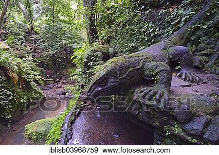 "Stone Komodo dragons at the Holy Spring Temple, Ubud Monkey Forest, Ubud, Bali, Indonesia, Asia" View Large Photo Image Stock Photo - "Stone Komodo dragons at the Holy Spring Temple, Ubud Monkey Forest, Ubud, Bali, Indonesia, Asia". Fotosearch