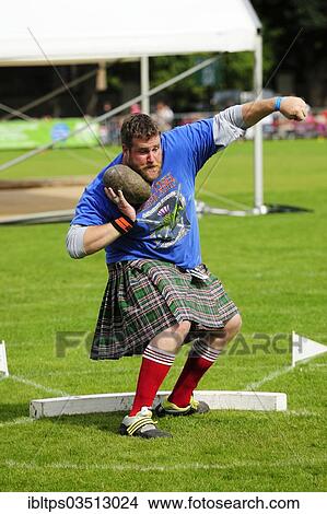 "Stone Put, a discipline in the Highland Games, Inverness, Highlands, Scotland, United Kingdom, Europe" View Large Photo Image Picture - "Stone Put, a discipline in the Highland Games, Inverness, Highlands, Scotland, United Kingdom, Europe". Fotosearch