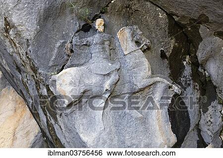 Stock Photograph - "Stone relief, Macedonian horse rider on the grave of Alcetas, ancient city of Termessos, Taurus Mountains, Termessos, Antalya Province, Turkey, Asia". Fotosearch