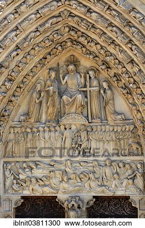 Stock Image - "Stone reliefs above the entrance of Cathedrale Notre Dame, Paris, Ile-de-France, France, Europe". Fotosearch