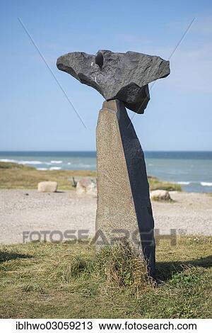 Stock Image - "Stone Sculpture by the sea, Hirtshals, Kommune Hjorring, Region Nordjylland, Jutland, Denmark, Europe". Fotosearch