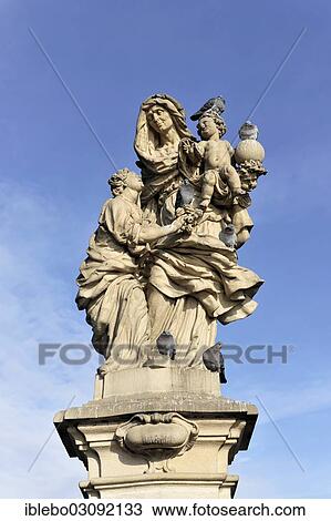 Stock Image - "Stone statue of St Anne, 1707, Charles Bridge, UNESCO World Heritage Site, Stare Mesto end, Prague, Czech Republic, Europe". Fotosearch